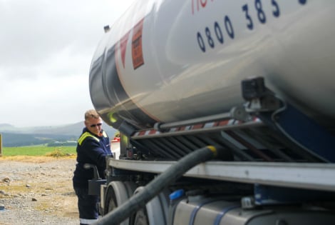 Allied driver delivering bulk fuel