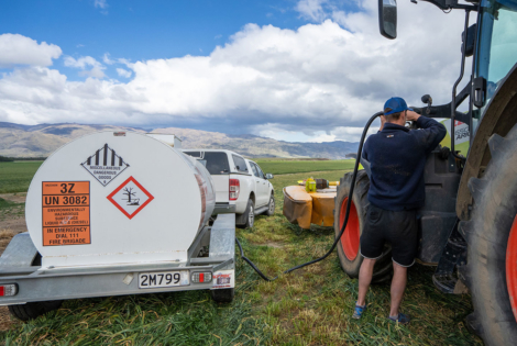 Man using Allied mobil trailer fuel tank